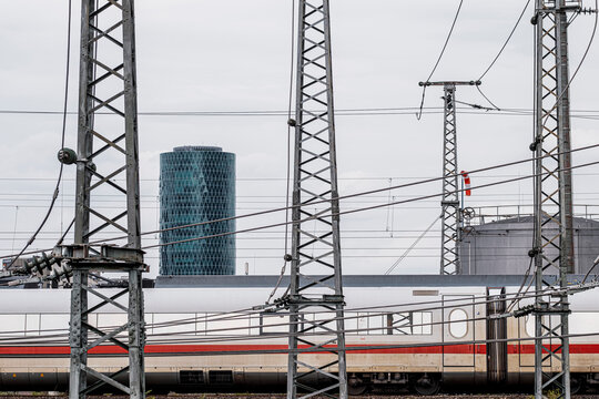 Clean commercial scene of train railway tracks with passenger wires and infrastructure for transit transport in Frankfurt Germany urban motion