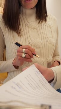 Close up of businesswoman signing official contract. Legal agreement, paperwork completion, financial transaction and business deal, Agreement finalization, success, partnership concept