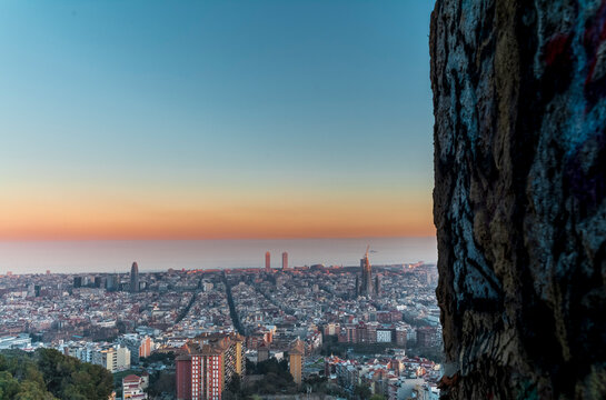 Barcelona City Skyline at Golden Hour with Sagrada Fam&iacute;lia and Mediterranean Sea, Aerial View