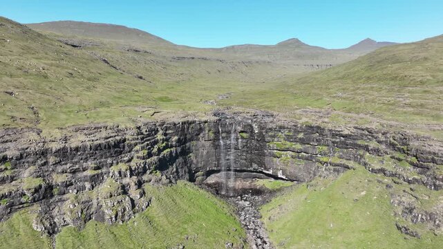 Drone shot of Foss&aacute; Waterfall, the highest waterfall on Faroe Islands