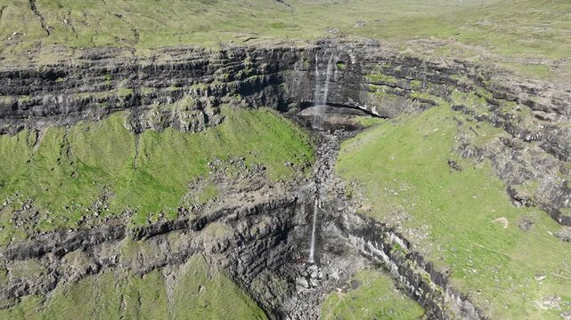 Drone shot of Foss&aacute; Waterfall, the highest waterfall on Faroe Islands