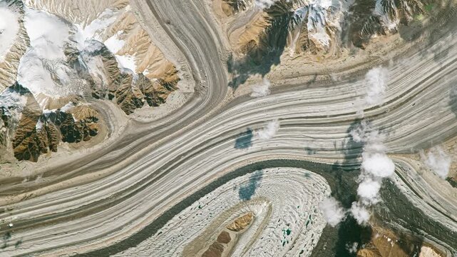 Bird's eye view on large glacier. Camera is zooming in, rotating clockwise. Animation based on image by NASA
