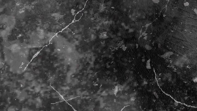 4K Cinematic dark grunge texture overlay featuring thick white scratches, mottled dirt, and cloudy smudges on a black background for VFX compositing.