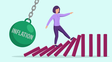 Fototapeta premium Economic instability concept: Woman balancing on falling dominoes due to inflation