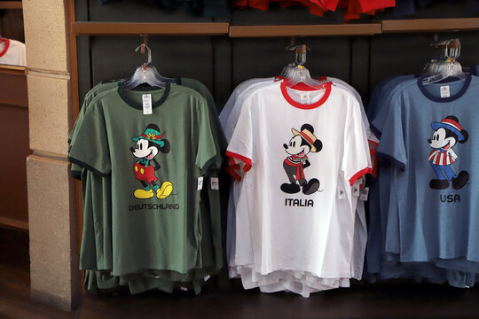 Mickey Mouse T-shirts representing the pavilions of Italy, Germany, and the USA 