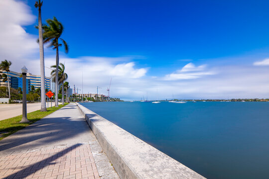 West Palm Beach scenic iew of the Intracoastal Waterway with smooth water and deep blue sky. Long exposure photography