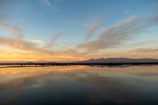 A reflective view of Alg&ouml;l Lake in Ereğli, Konya, at sunset.