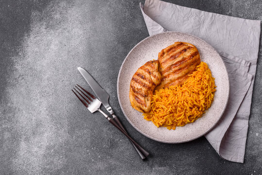 Dajaj Mashwi, an Arabic dish with rice and chicken, salt, and spices. Dajaj Mashwi as a background