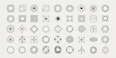 Geometric shapes and symbols are arranged in rows on a plain surface.