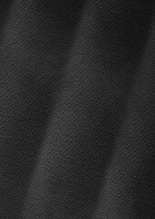 Fototapeta premium Closeup of dark gray textured fabric with subtle folds. Suitable for background designs, textile concepts, and monochromatic visual content creations.