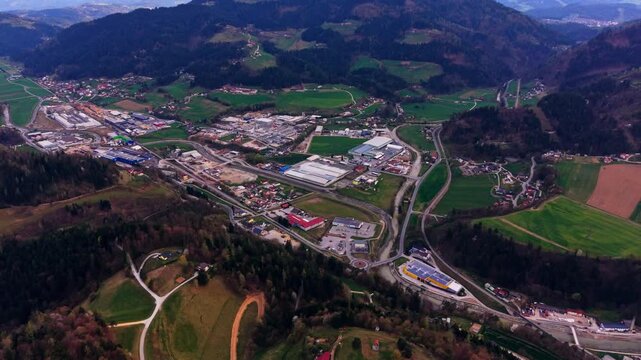 Drone flyover industrial zone in valley