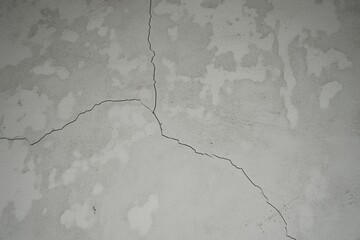 Close up texture of an old cracked building wall © Liada