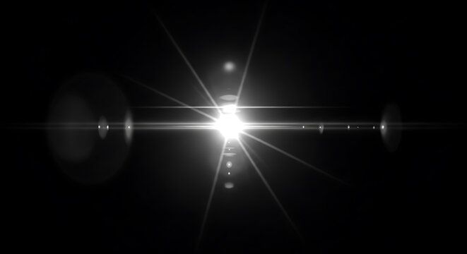 Bright light flare with starburst rays and circular bokeh against a black background
