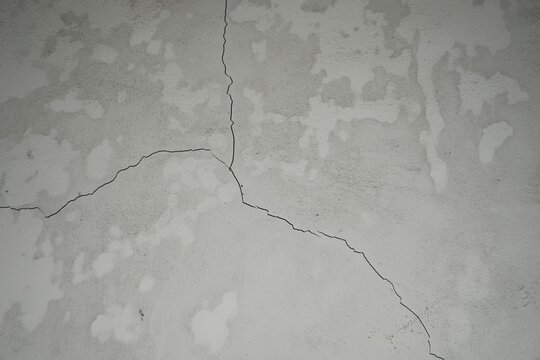 Close up texture of an old cracked building wall