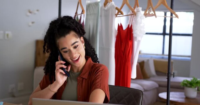 Vertical video: Getting call woman at home in rust top on phone using laptop reaching rack styling