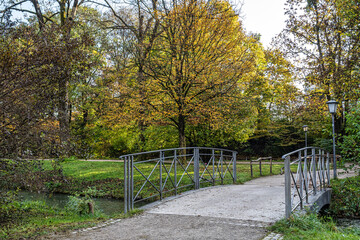 Fototapeta premium Golden autumn view in famous Munich relax place - Englischer Garten. Munich, Bavaria, Germany