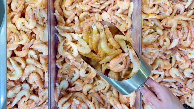 Buying shrimps at the grocery store	