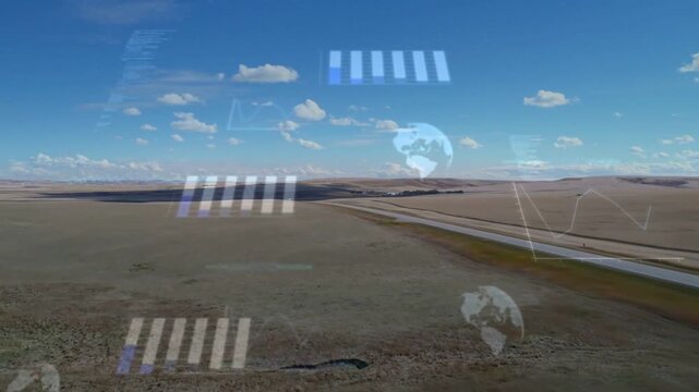 Displaying aerial view showing curving two-lane road crossing open farmland, HUD graphics shifting