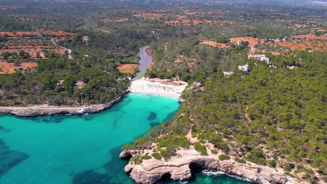 4K Aerial View of S'Amarador and Cala Mondrago Beaches. Cinematic Drone Video of Three Turquoise Bays and Two White Sand Beaches in Mondrago National Park. Mallorca Balearic Islands Spain.