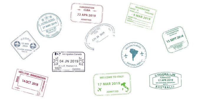 Passport stamped with Canadian immigration stamps. Visible entry and exit dates. Stamps indicate travel through Pearson Airport. Ideal for travel, immigration, or visa-related content