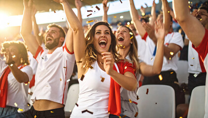 Fototapeta premium Cheering Fans Celebrating Victory in Stadium