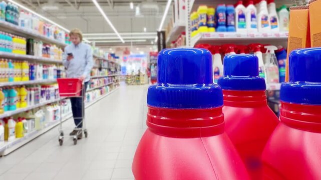 Choosing washing powder ,detergent,liquids at the Groceries.