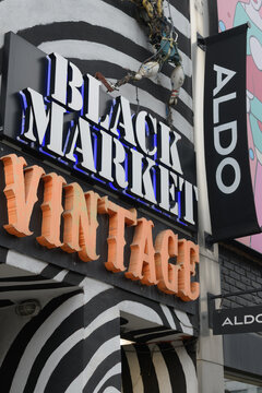 exterior building and sign of Black Market Vintage Underground and Aldo at 256 Queen St W, Toronto