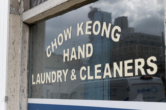 vintage ghost sign of Chow Keong Hand Laundry & Cleaners at 176 Avenue Rd, Toronto