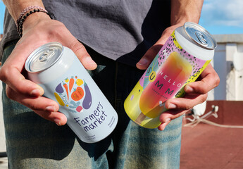 Person Holding White Mockup Outside