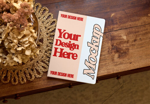 Book Cover Mockup on a Wooden Table