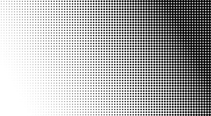 Black halftone dot gradient background with fading comic style dotted pattern © Pixrow