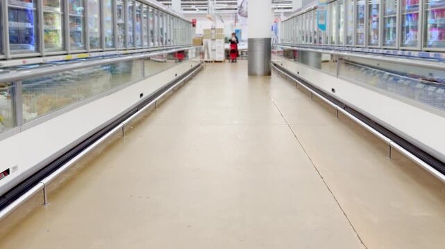 Choosing food from shelf at the supermarket,vegetables in the grocery section, Grocery stores 