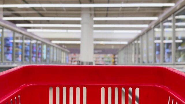 Choosing food from shelf at the supermarket,vegetables in the grocery section, Grocery stores 