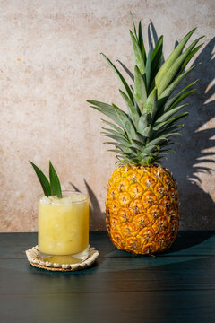 Pina Colada on the rocks with a whole pineapple 