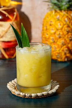 Pina Colada on the rocks with a whole pineapple 