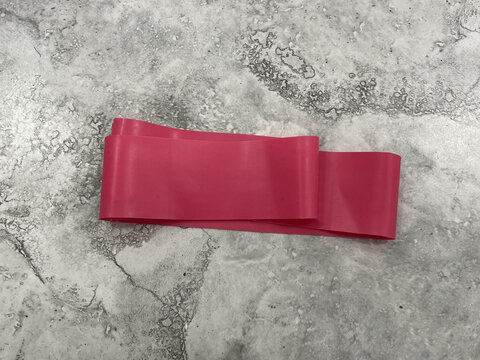 elastic resistance band on the floor in gym