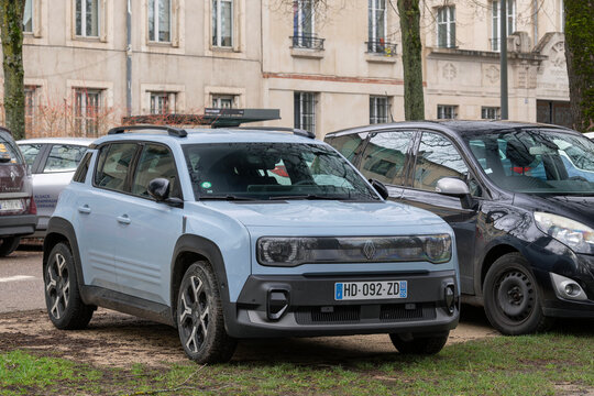 Nancy, France - February 13th 2026 : View on a blue Renault 4 E-Tech in Techno version finished in blue Cloud parked on a parking lot.
