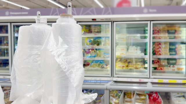 Choosing food from shelf at the supermarket,vegetables in the grocery section, Grocery stores 