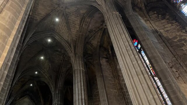 Soaring Gothic Nave and Pillars of the Narbonne Cathedral Interior
