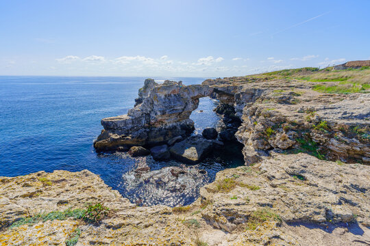 Cliffs and the arch on the coast of Tyulenovo