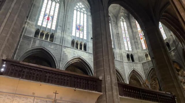 Soaring Gothic Nave and Pillars of the Narbonne Cathedral Interior