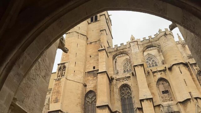 Towering Gothic Facade of the Cath&eacute;drale Saint Just et Saint Pasteur