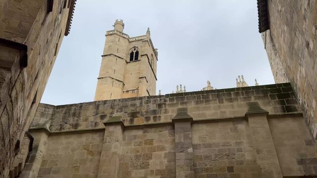 Towering Gothic Facade of the Cath&eacute;drale Saint Just et Saint Pasteur