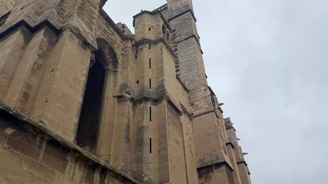 Towering Gothic Facade of the Cath&eacute;drale Saint Just et Saint Pasteur