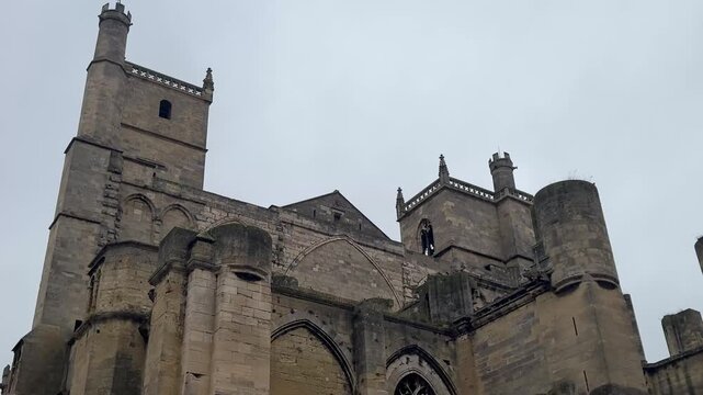 Towering Gothic Facade of the Cath&eacute;drale Saint Just et Saint Pasteur