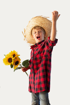 Caucasian child dressed for the June fiestas in Brazil, isolated on a light background
