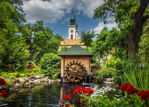 Small watermill next to a pond in a park in Sombor, a city in Vojvodina, Serbia
