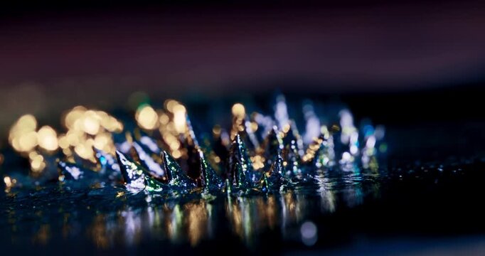 A stunning visual of reactive metal particles on a black background, perfect for motion graphics and abstract effects, inspiring creativity and unique ideas for artists and designers
