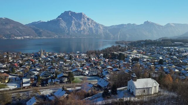 Aerial view of Altm&uuml;nster village and Traunsee lake in winter landscape, Austria