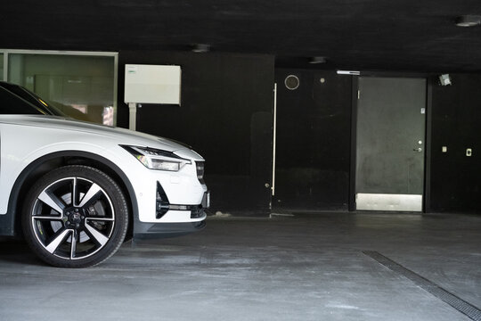 Bor?s, Sweden - May 28 2023: Modern electric car parked in underground garage.